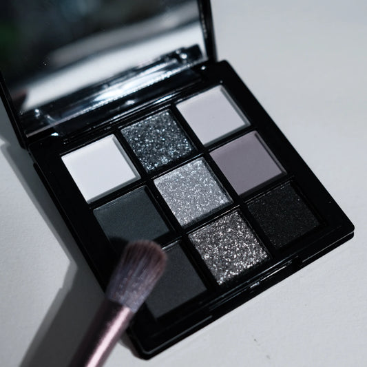 "9-Color Eyeshadow Palette: Dark Black, Grey, and Silvery Shades for Smokey Looks and Performance Makeup"